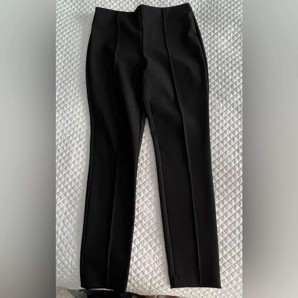 Black stretchy pull on skinny pants, sz 8. New, no tags.